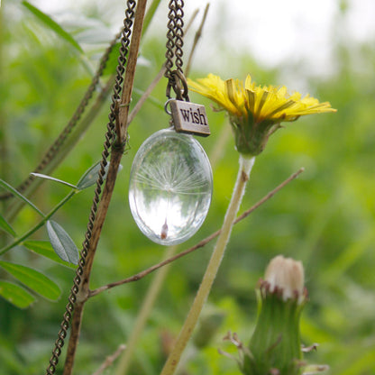 Collane con fiori pressati in resina - Dente di leone in cristallo ovale