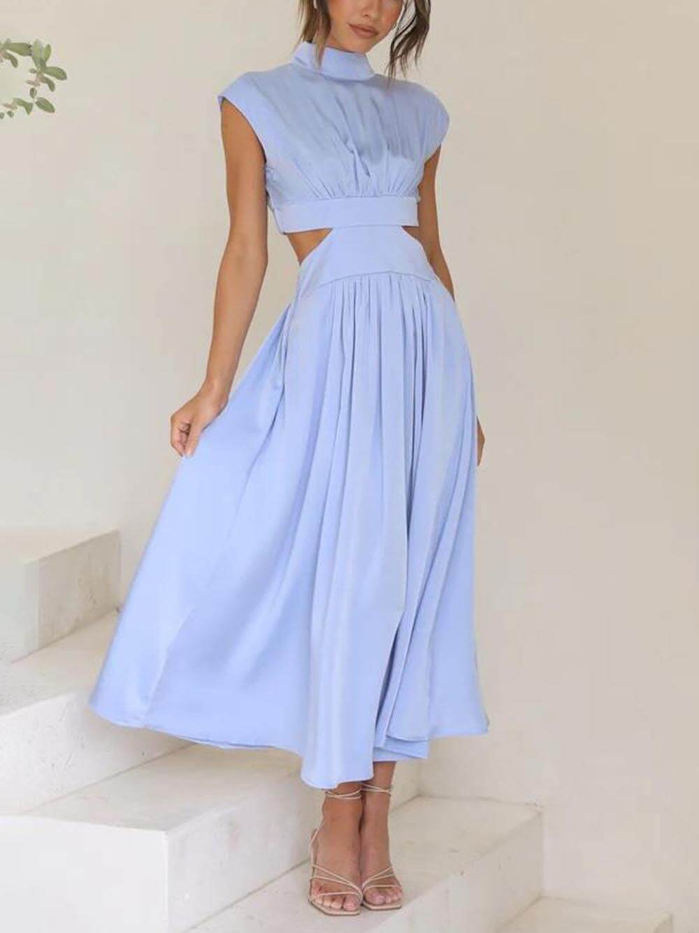 Robe midi de vacances avec poches et découpe à la taille