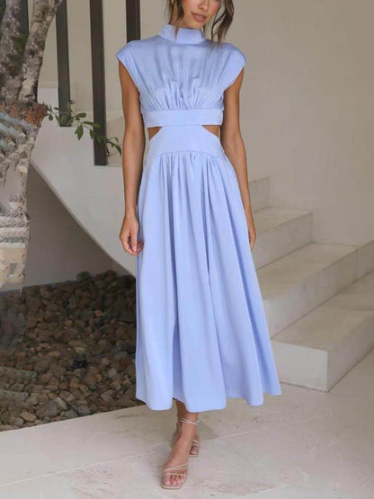 Robe midi de vacances avec poches et découpe à la taille