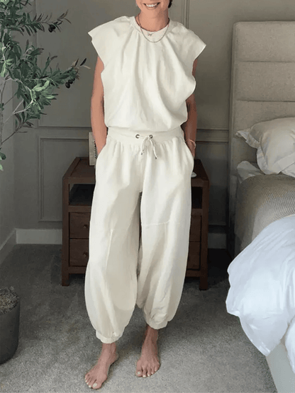 Rygløs korset jumpsuit