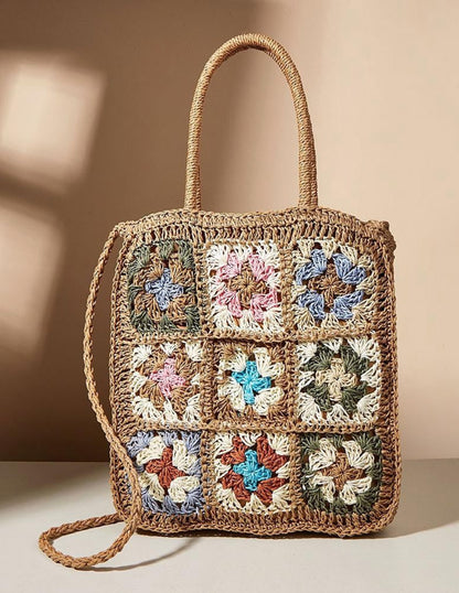 Bolso de paja tejido con flores de colores