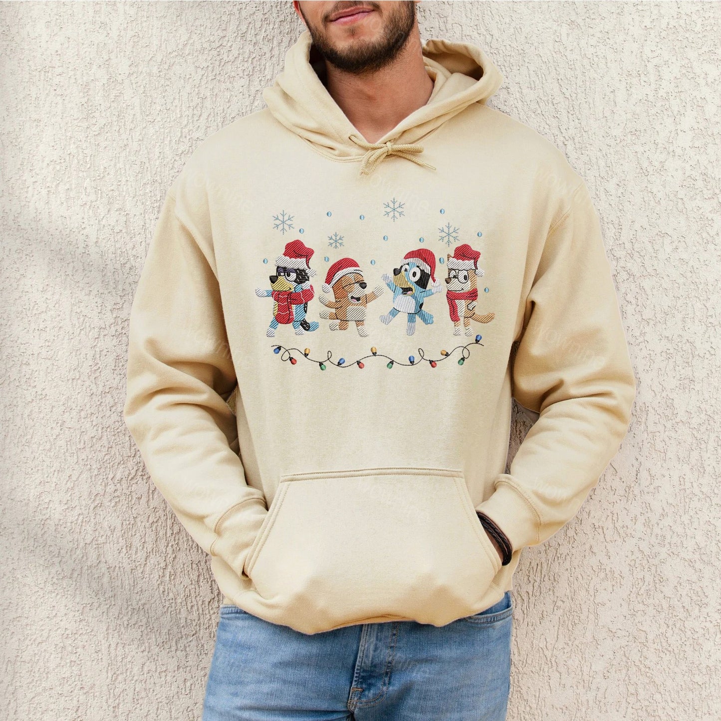 Sudadera bordada con familia de perros navideños