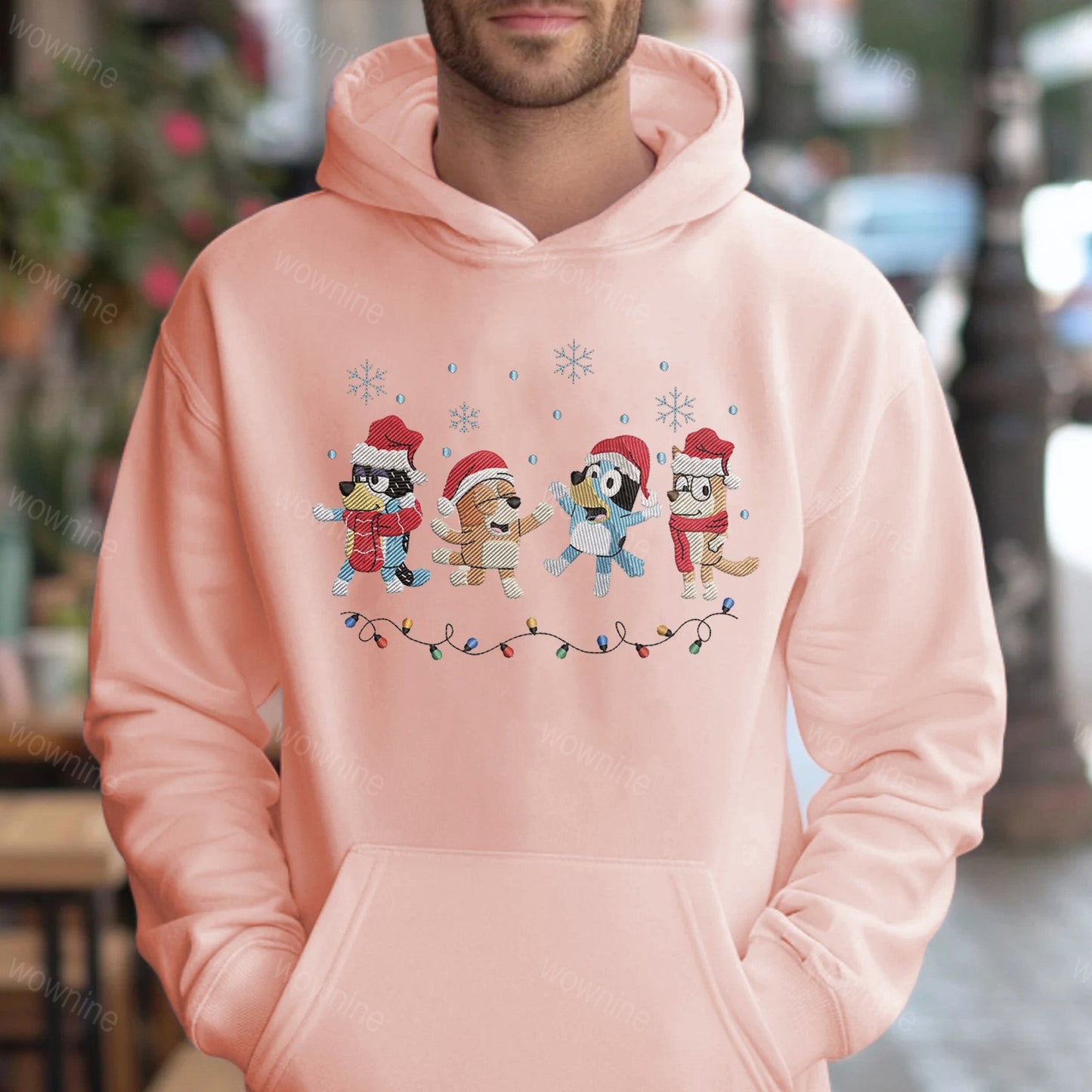 Sudadera bordada con familia de perros navideños